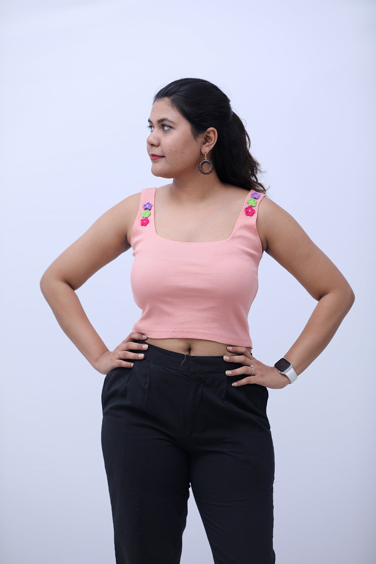 Pink ribbed tank top with crochet flowers