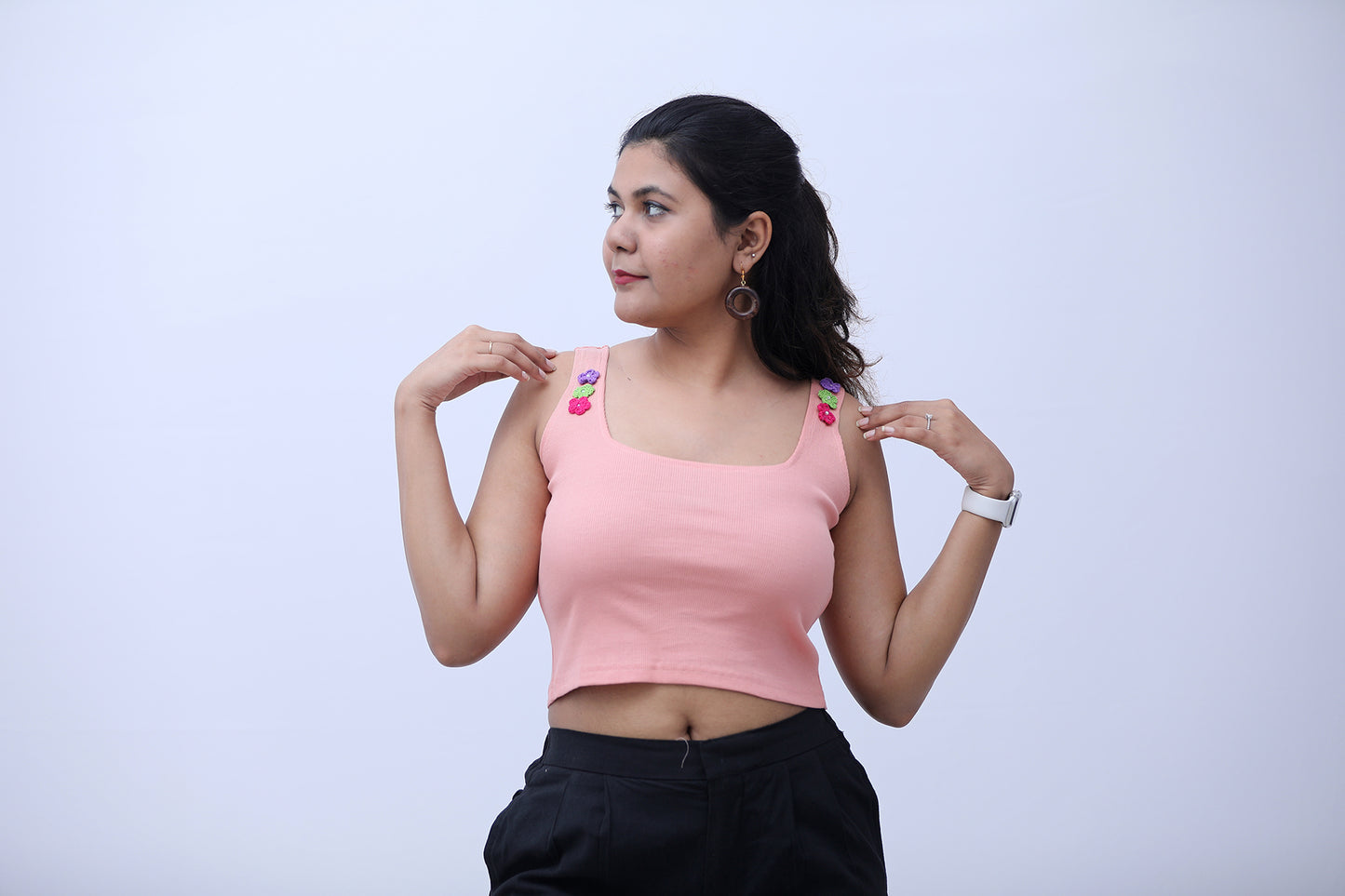 Pink ribbed tank top with crochet flowers