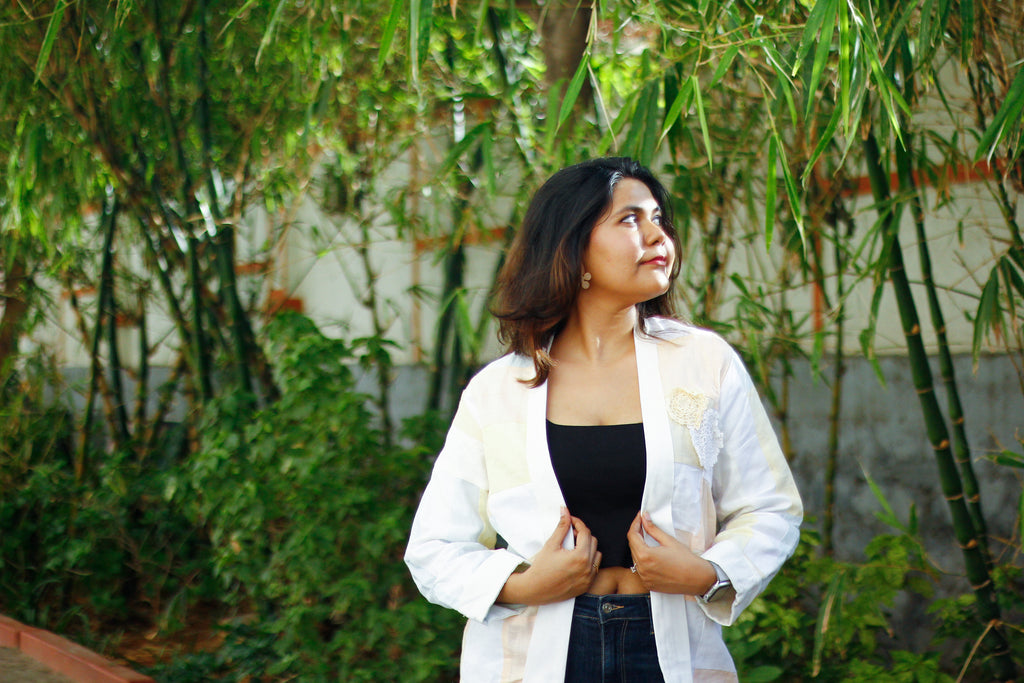 Upcycled hemp jacket with crochet flowers